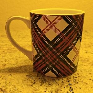 Red tartan mug with gold accents